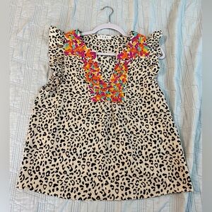 Women’s embroidered cheetah print blouse Brand is THML